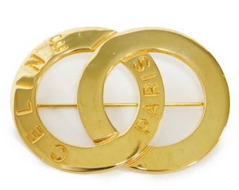 W5 Vintage Celine golden brooch in double circle, round motif with embossed logo. Great vintage gift. Can be a scarf pin. 050929ya1