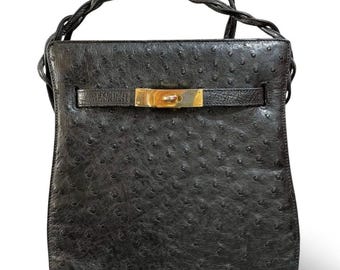 Vintage BALLY genuine ostrich leather shoulder bag purse with gold tone hardware and twisted straps. 061024y1