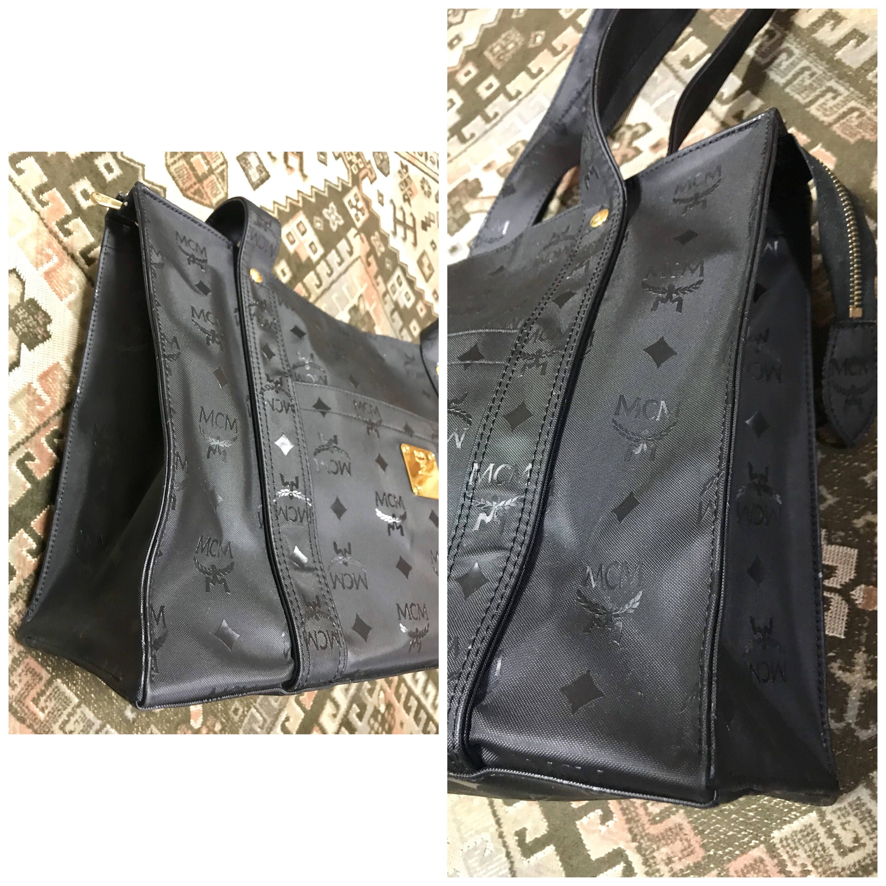 Sold at Auction: MCM Black Monogram Shopper Bag, with gun metal hardware  and zip closure, the interior of the bag lined in black satin monogram  print