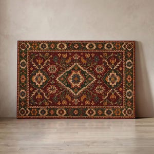 May include: A rectangular area rug featuring a deep red background with a central diamond motif, intricate floral patterns, and stylized bird figures in shades of green, gold, and cream, framed by a wide, ornate geometric border.