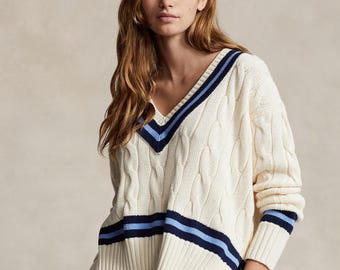 Polo Ralph Lauren Creme Zopfmuster Cricket Pullover | Marine-blauer Streifen-Pullover mit V-Ausschnitt