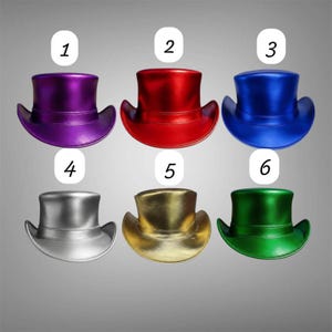 May include: Six top hats arranged in two rows, each featuring a metallic finish. The colors include purple, red, blue, silver, gold, and green. Each hat is labeled with a white numbered tag from one to six, indicating distinct color options.