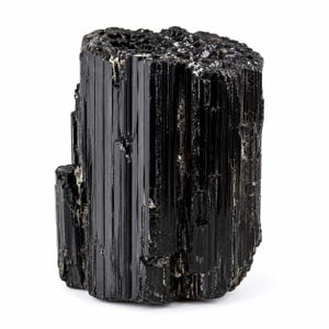 May include: A raw black tourmaline crystal specimen featuring a vertical, striated, and columnar structure with a glossy, reflective surface. The mineral displays a deep black coloration with sharp, jagged edges and a rough, crystalline top texture.
