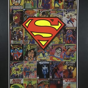 May include: A rectangular poster featuring a collage of various vintage Superman comic book covers arranged in a grid. A large, iconic red and yellow Superman 'S' shield logo is centered prominently over the comic book images.