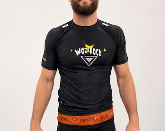 Woj Lock the World Rashguards