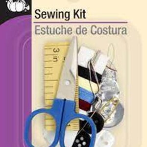 May include: A sewing kit with a ruler, scissors, thread, buttons, and a needle. The kit is packaged in a clear plastic bag with a purple and white background. The text on the package reads "Sewing Kit" and "Estuche de Costura".