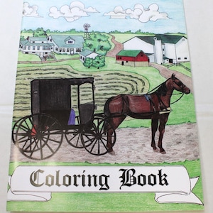 May include: A black and white colouring book featuring a horse-drawn buggy in front of a farm. The title of the book is "Colouring Book".