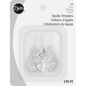 May include: Three silver needle threaders in a clear plastic package. The package has the text "Dritz", "Sew Couture Coser", "Needle Threaders", "Enfileurs d'aiguille", "Enhebradores de Agujas", and "3 PC-PZ".