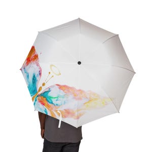 Artistic Halo Butterfly Foldable Umbrella - Colorful Design, Portable Rain Protection, Stylish Rain Gear, Unisex Umbrella