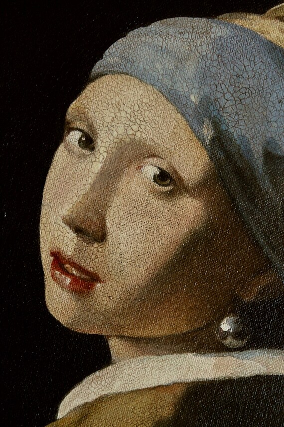 フェルメール作「真珠の耳飾りの少女」：額入りキャンバスに描かれた