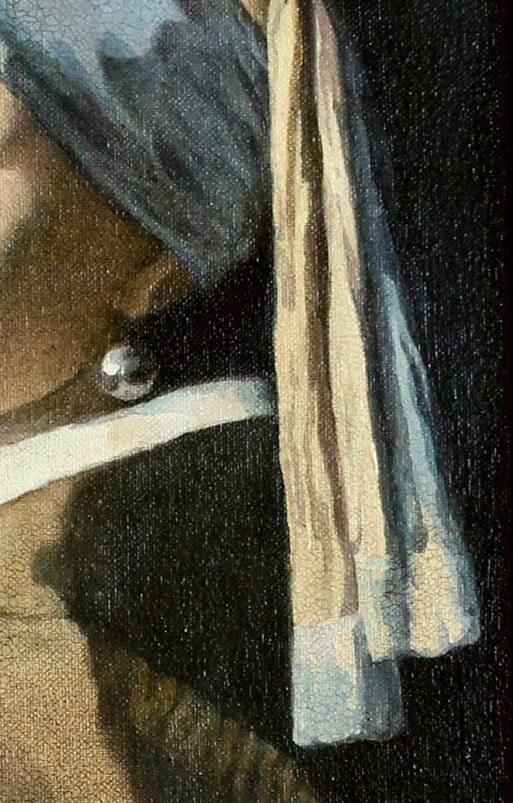 フェルメール作「真珠の耳飾りの少女」：額入りキャンバスに描かれた