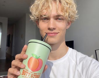 Insulated tumbler with a straw
