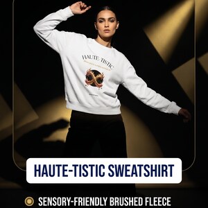 May include: A white long-sleeve sweatshirt featuring the text HAUTE-TISTIC and a graphic of a flaming infinity symbol. The design includes the smaller text When you're autistic and not AF. The garment has a crew neckline and ribbed cuffs.