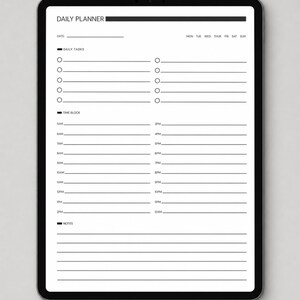 May include: A digital tablet displaying a daily planner template with black text on a white background. The layout includes sections for date, days of the week, daily tasks with circular checkboxes, a time block schedule from 5AM to 12AM, and notes.