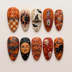 May include: Ten almond-shaped press-on nails featuring Halloween-themed designs. Patterns include orange polka dots, checkered prints, sun and moon faces, a witch hat, a potion bottle, skulls, bats, pumpkins, and a black cat on an orange background.
