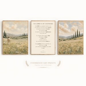 May include: A set of three rectangular wall art prints. The left and right prints feature a landscape painting of a grassy field with a figure and sheep under a cloudy sky. The centre print displays the text of Psalm 23, The Lord is My Shepherd.