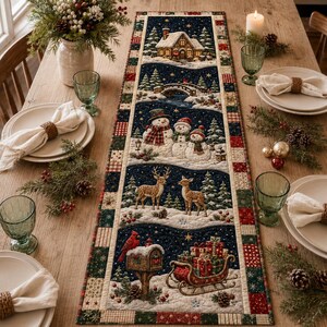 May include: A rectangular quilted table runner featuring a winter scene with a cabin, a bridge, snowmen, deer, a mailbox, and a sleigh filled with gifts. The design is bordered by a patchwork pattern of red, green, and cream squares.