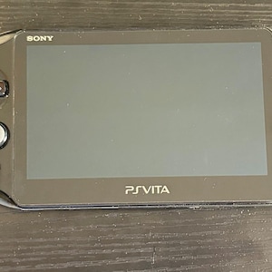 PlayStation Vita Excellent 128GB Power Pack Custom Bundle + Cargador + Juegos
