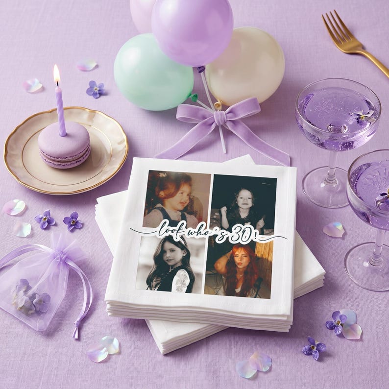 May include: A stack of white paper napkins featuring a four-photo collage of a person at different ages, with the text "look who's 30!" in black script. The napkins are surrounded by lavender balloons, a purple macaron with a candle, and purple drinks.