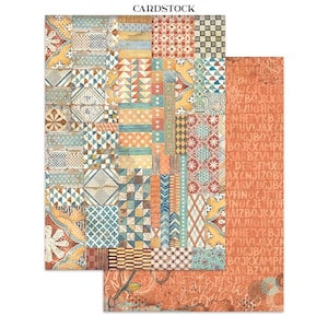 May include: Two sheets of patterned cardstock. The larger sheet features a patchwork design with geometric shapes in shades of orange, blue, and yellow. The smaller sheet has a printed text design in orange. The word "CARDSTOCK" is printed at the top.