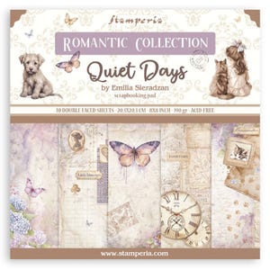May include: A scrapbook paper pad from the Romantic Collection, titled "Quiet Days." The cover features illustrations of a puppy, butterflies, and a girl with a cat. The pad contains 10 double-sided sheets, each 8x8 inches (20.3 x 20.3 cm), and is acid-free.