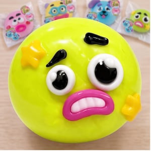 Hundansikte Squishy Stressboll Mjuk TPR Flerfärgad Swap Design Långsam Rebound Textur för Avslappning