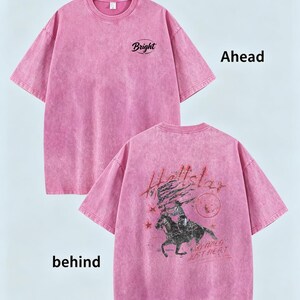 May include: A pink acid-wash short-sleeve t-shirt. The front features the word Bright in a black oval. The back displays a graphic of a person riding a horse with the text Hellstar and No Time Just Heat, accompanied by stars and a circular emblem.