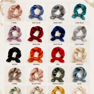 May include: A color display chart featuring twenty square silk scarves tied in knots, labeled with colors including pink, mist blue, dark gray, lake blue, taro purple, wine red, navy blue, light gray, black, orange, red, apricot, camel, blush pink, grass green, blue, light green, khaki, yellow, and milky white.