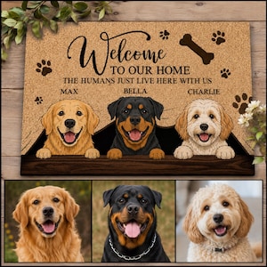 May include: A rectangular tan coir doormat featuring the text Welcome to our home, the humans just live here with us. It includes illustrations of three dogs, labelled Max, Bella, and Charlie, with paw prints and a bone graphic printed on the surface.