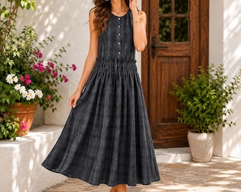 Mouwloze zwarte midi-jurk, zwarte mouwloze midi-jurk, gebreid in Europese stijl