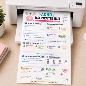May include: A white paper sheet titled ADHD Task Paralysis Reset featuring a brain illustration, numbered sections from one to seven, checkboxes, and prompts to help manage tasks. The document includes colorful icons and text for task planning.