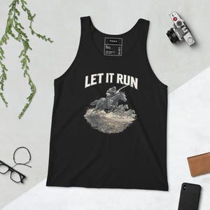 May include: A black tank top featuring a white graphic print of a person riding a horse with the text LET IT RUN arched above the illustration. The design depicts a horse galloping through water with smaller horses following behind in the background.