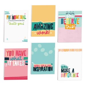 May include: A set of six rectangular notepads featuring colourful graphic designs and motivational text including PHENOMENAL that's you, AMAZING work, YOU DESERVE THIS, YOU HAVE what IT TAKES, you are an INSPIRATION, and you MAKE A DIFFERENCE.