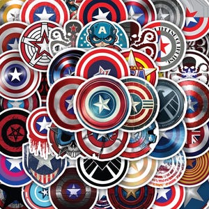 May include: A collection of circular stickers featuring various Captain America shield designs, including classic red, white, and blue patterns, metallic textures, skull motifs, Hydra logos, and S.H.I.E.L.D. emblems, all arranged in a dense, overlapping collage.
