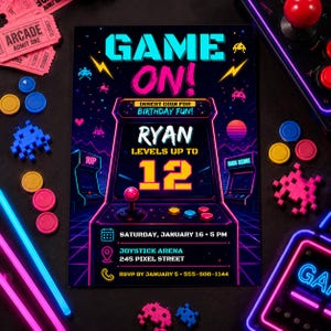 May include: A rectangular birthday invitation card featuring a neon arcade theme with the text GAME ON!, RYAN LEVELS UP TO 12, and event details including Saturday, January 16 at 5 PM, Joystick Arena, 245 Pixel Street, and RSVP 555-908-1144.
