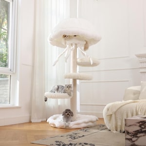 May include: A white, multi-level cat tree shaped like a jellyfish with a plush, rounded top canopy, dangling fabric tentacles, and several circular platforms. A grey cat sits on a middle platform, while a small dog rests on the base.