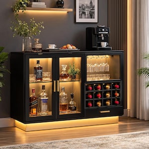 May include: A black sideboard cabinet featuring two glass-front doors with gold handles, internal LED lighting, a built-in wine rack for twelve bottles, a hanging stemware rack, and a single drawer with a gold handle at the base.