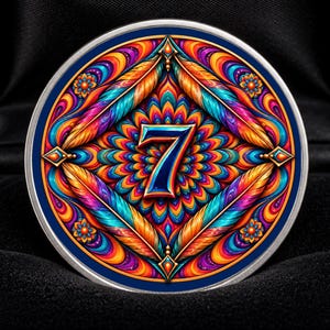 May include: A circular medallion featuring a prominent number 7 at the centre, surrounded by a vibrant, symmetrical pattern of colourful feathers and floral motifs in shades of blue, orange, purple, and yellow, presented in a black display case.