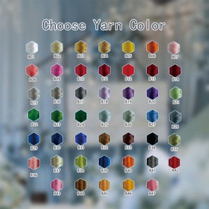 May include: A color chart titled Choose Yarn Color featuring forty-seven hexagonal swatches arranged in a grid. Each swatch displays a unique thread color labeled with a code from B01 to B47, showcasing a wide spectrum of shades including neutrals, pastels, and vibrant tones.