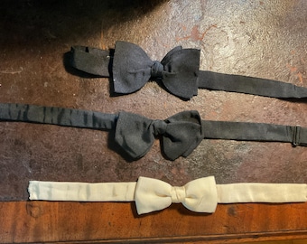 A lot of three antique 1930-1940s pre tied bow ties