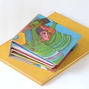 May include: A rustic wooden sign with the text "Welcome to our porch" in white lettering. The sign features a distressed finish and a simple, inviting design, perfect for outdoor decor.