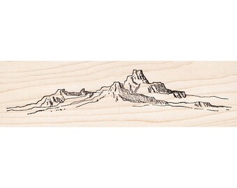 May include: A black and white line drawing of a mountain range with a tall peak in the center.