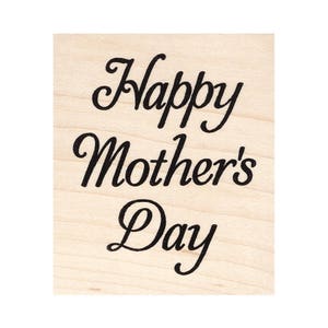 May include: A wooden stamp with the text "Happy Mother's Day" in a cursive font.