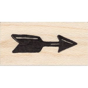 May include: A black wooden stamp with a simple arrow pointing to the right.