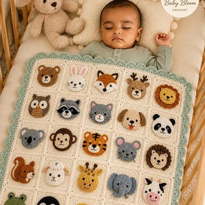 May include: A cream-colored crochet baby blanket featuring a grid of twenty-five individual squares, each decorated with a unique crocheted animal face, including a bear, rabbit, fox, deer, lion, owl, raccoon, cat, dog, panda, koala, monkey, tiger, mouse, squirrel, sheep, giraffe, elephant, cow, frog, penguin, duck, bee, and a heart, finished with a scalloped sage green border.