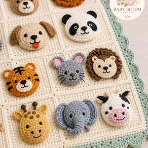 May include: A cream-colored crochet baby blanket featuring a scalloped sage green border and various animal face appliques including a deer, lion, dog, panda, tiger, mouse, hedgehog, giraffe, elephant, and cow. A circular logo reads BABY BLOOM CROCHET.