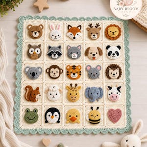 May include: A cream-colored crochet baby blanket featuring a grid of twenty-five squares, each displaying a different crocheted animal face or a heart. The blanket has a scalloped light green border and includes the text Baby Bloom Crochet.