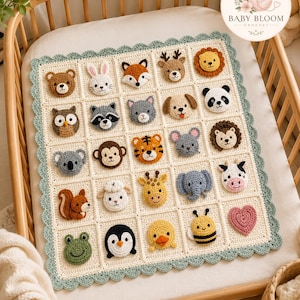 May include: A cream-colored crochet baby blanket featuring a grid of twenty-five square patches, each displaying a different crocheted animal face or a heart. The blanket has a scalloped sage green border and includes a Baby Bloom Crochet logo.