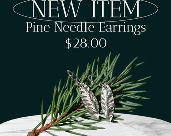 Orecchini con aghi di pino