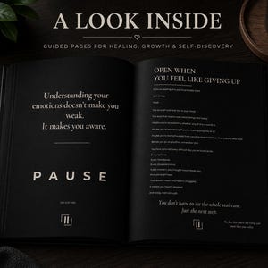 May include: An open book with black pages and white text. The left page reads, Understanding your emotions doesn't make you weak. It makes you aware. PAUSE. The right page is titled, OPEN WHEN YOU FEEL LIKE GIVING UP, followed by reflective text.